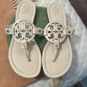 Tory Burch white/cream flat sandals size 7.   Lightly worn.